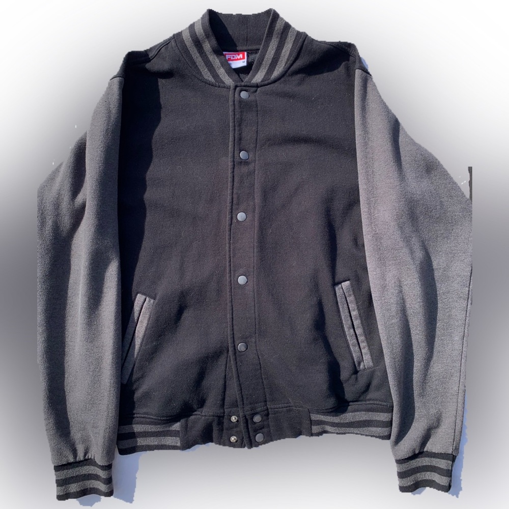 Black and grey varsity jacket. Mens medium.